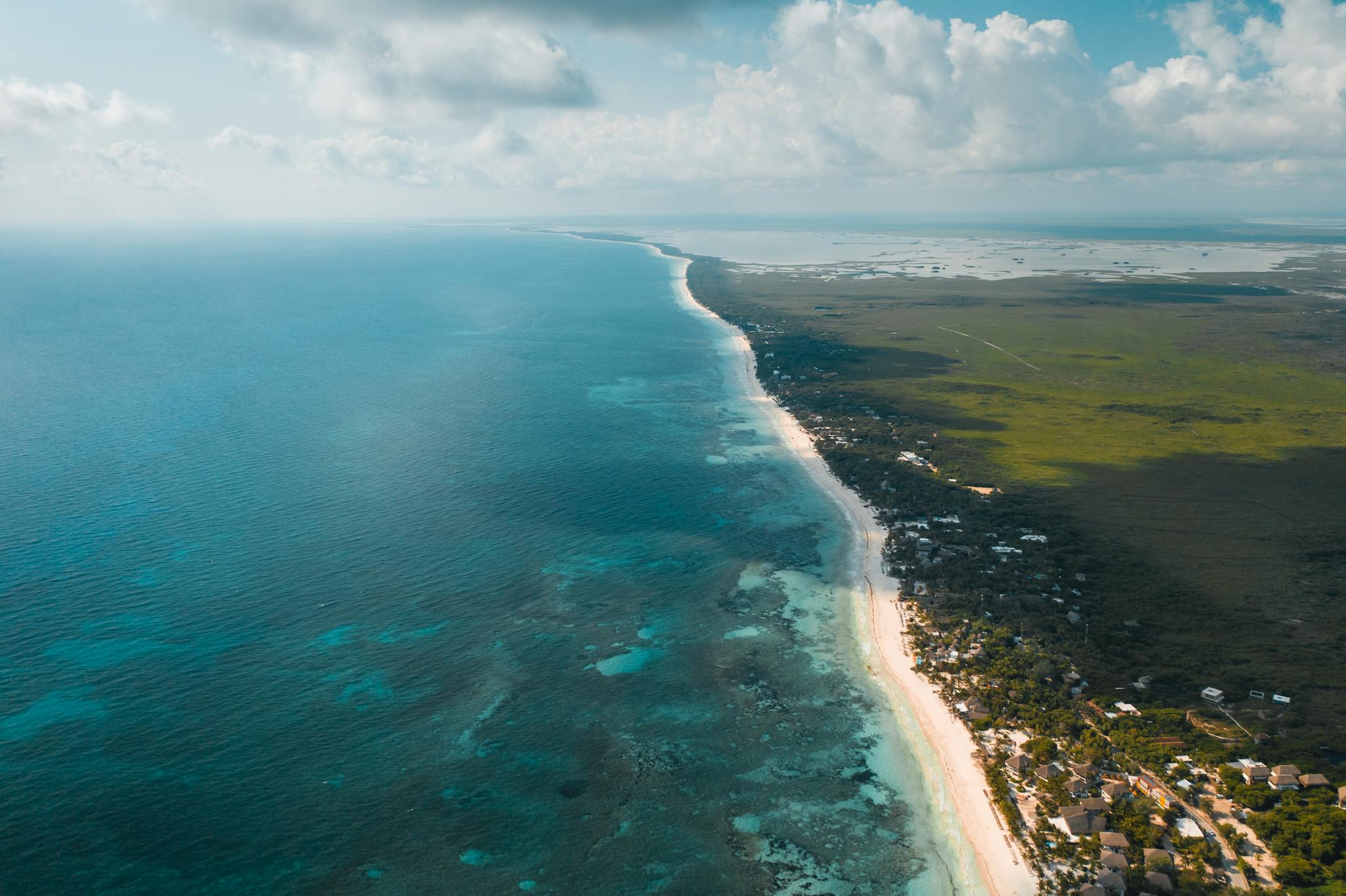 tulum vs playa del carmen real estate investment